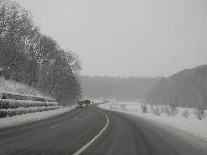Trucks on Snowy Highway