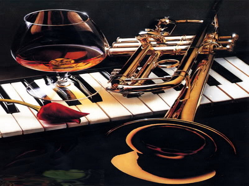 Trumpet on piano with cognac