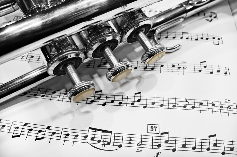Trumpet on Sheet Music — Black