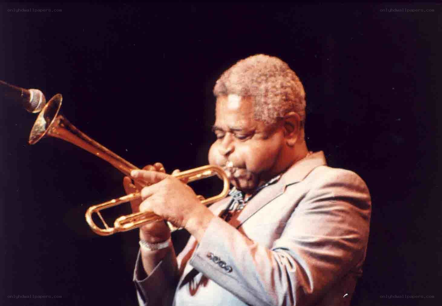 Trumpet player performing on stage