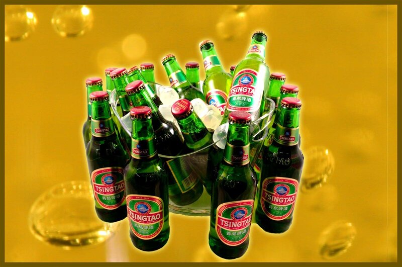 Tsingtao beer bottles in ice bucket