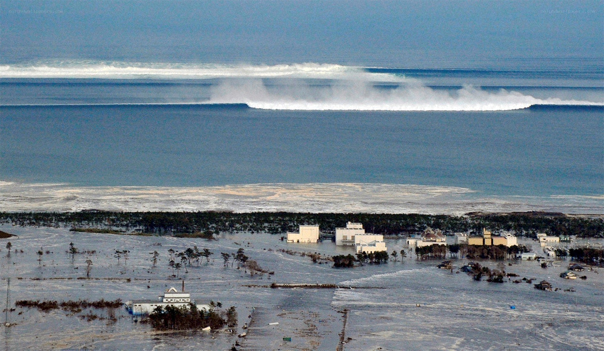 Tsunami hitting coastal town