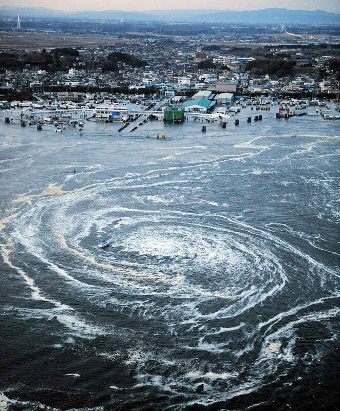 Tsunami swirl near coastal town