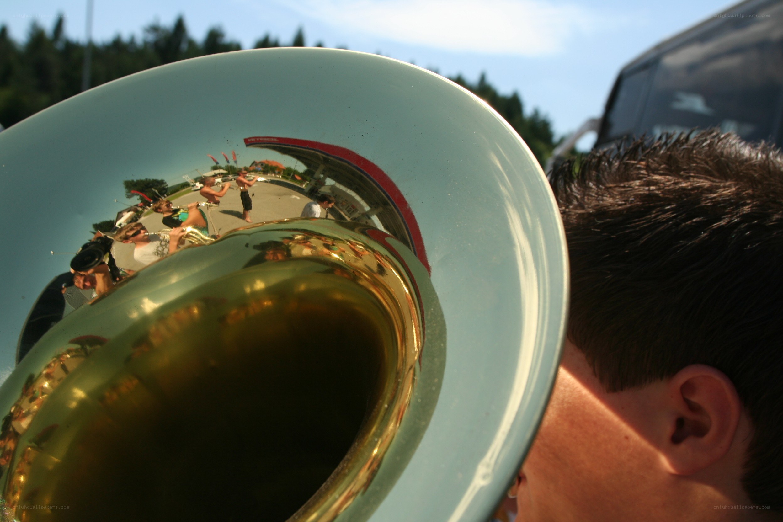 Tuba reflection of a parade