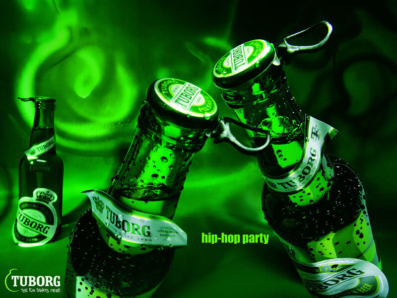 Tuborg beer bottles at a party