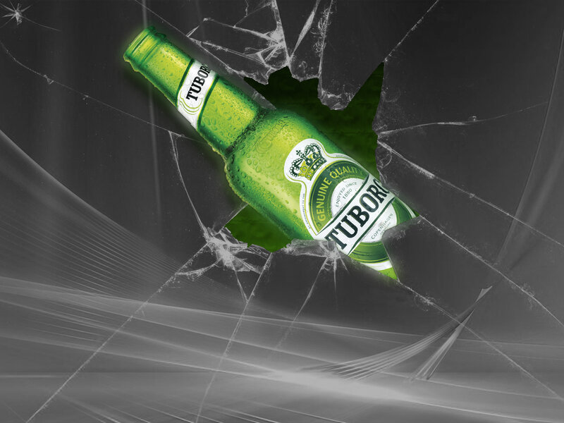 Tuborg bottle breaking glass