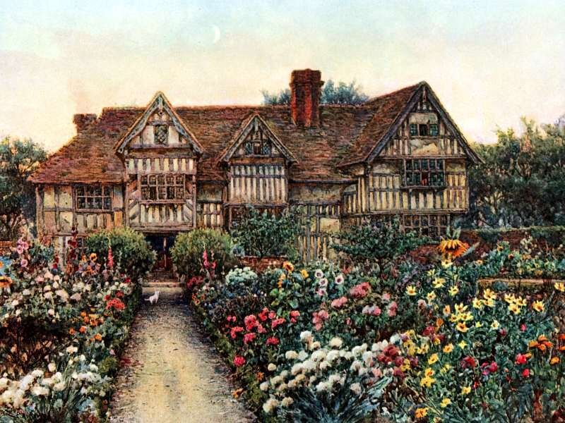 Tudor house with flower garden