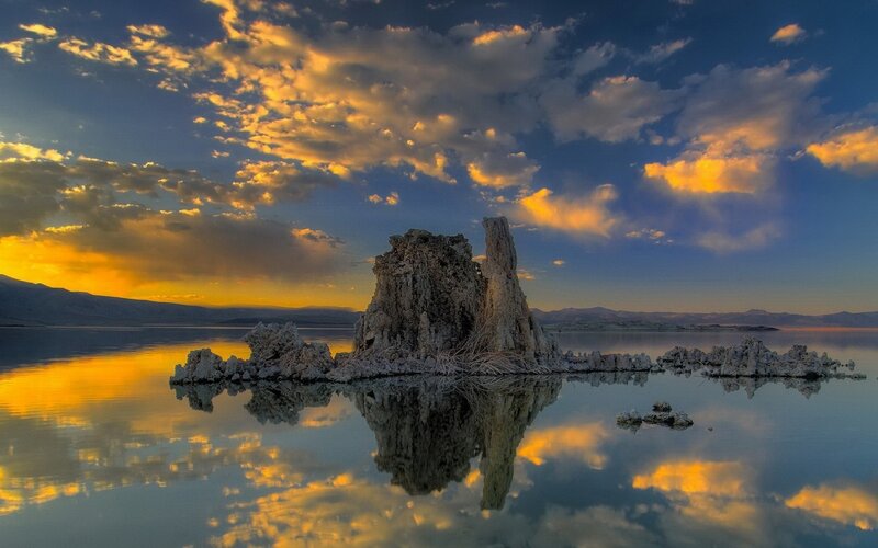 Tufa Formation in Lake — Blue