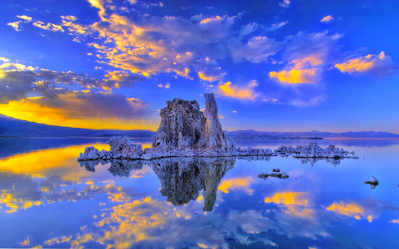 Tufa Formations in Lake — Blue, Serene, Sunset, Photograph, Clouds