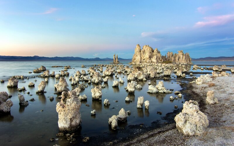 Tufa Formations in Lake — Blue, Serene, Sunset, Photograph, Mountains, Sky, White, Gray