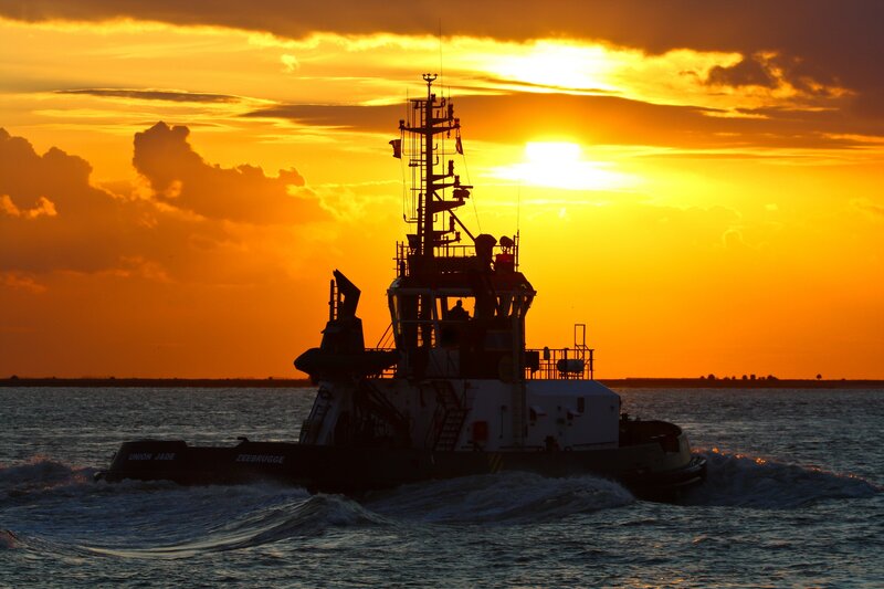Tugboat at Sunset — Orange