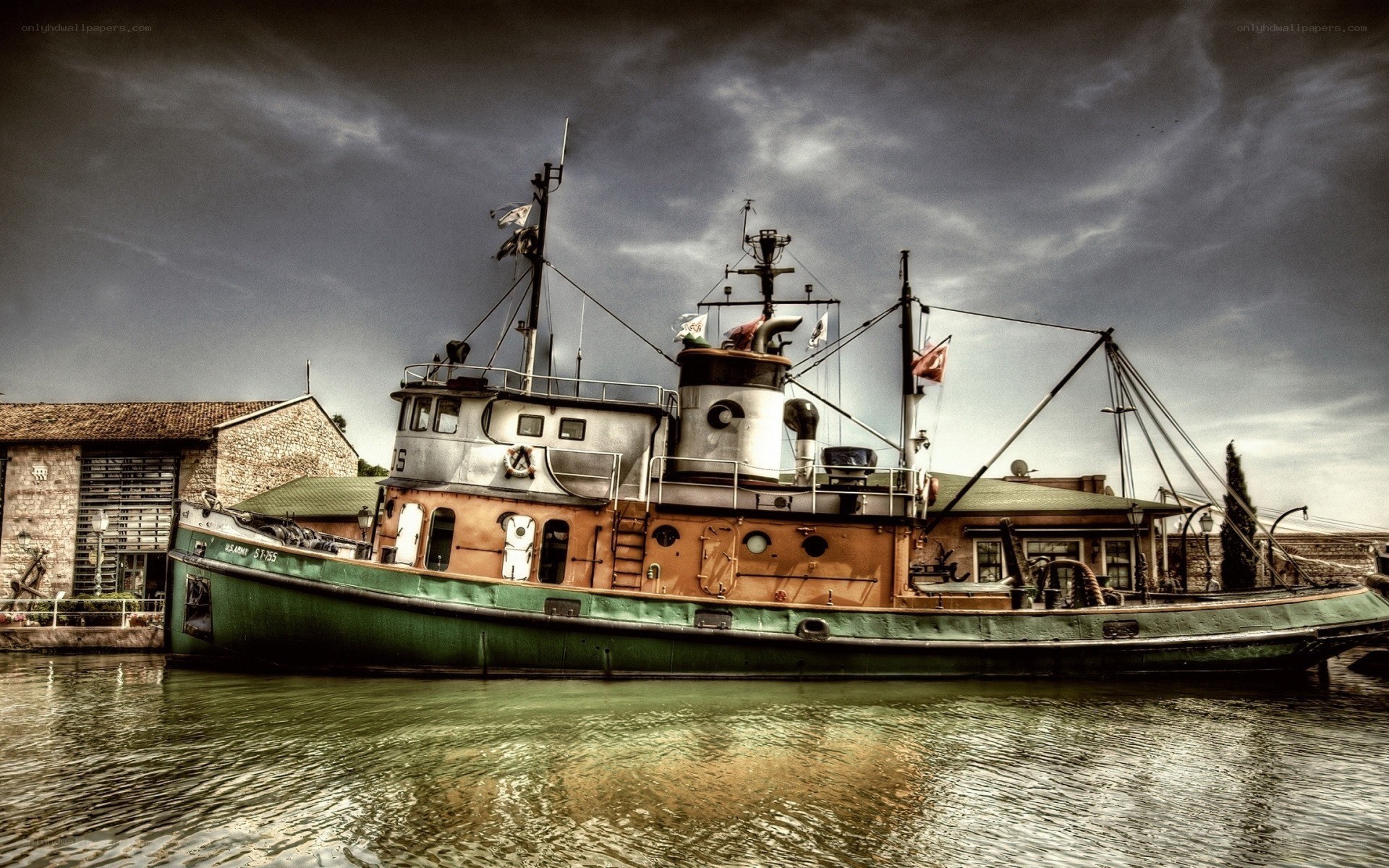 tugboat in harbor at dusk