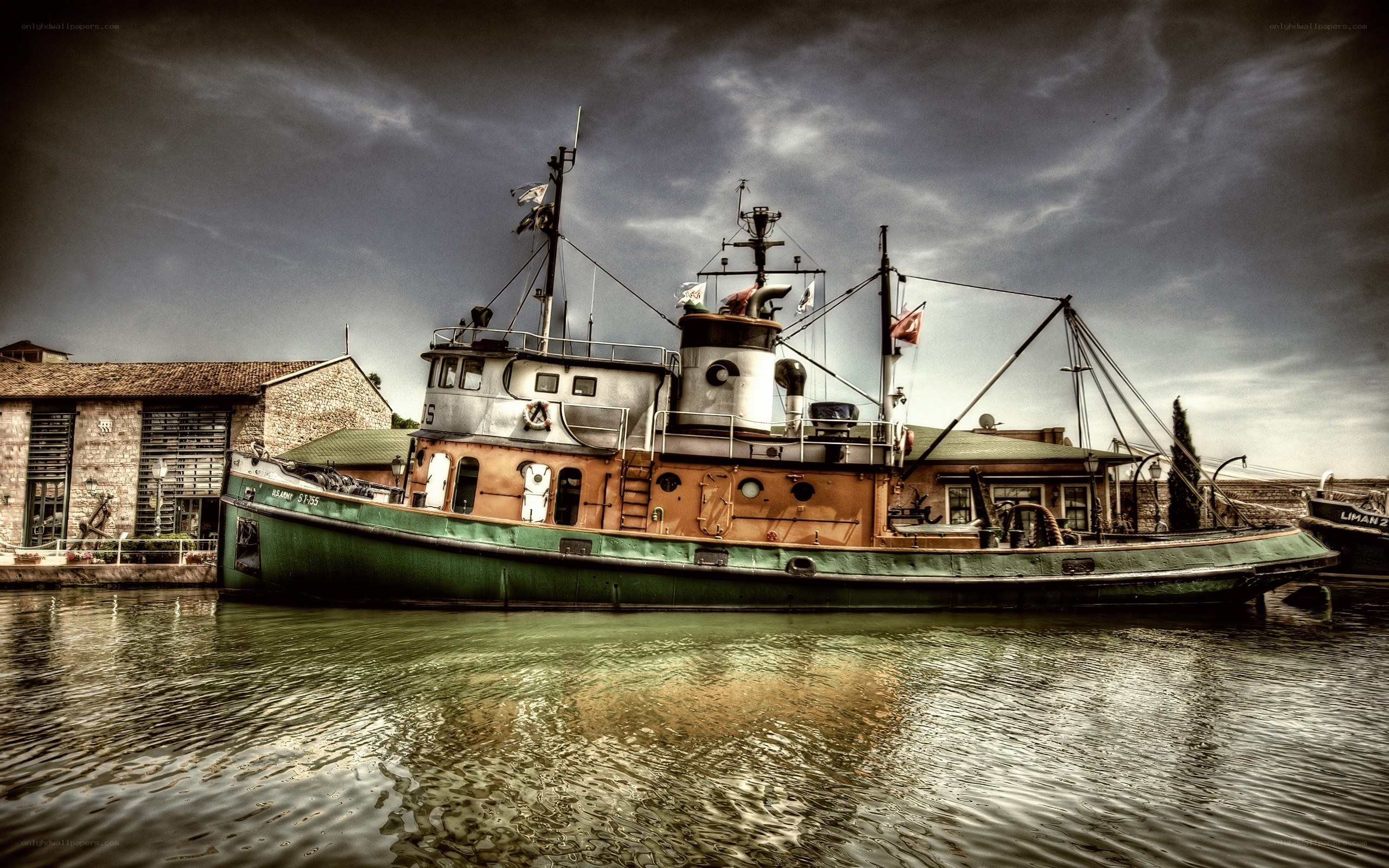 tugboat in harbor at dusk