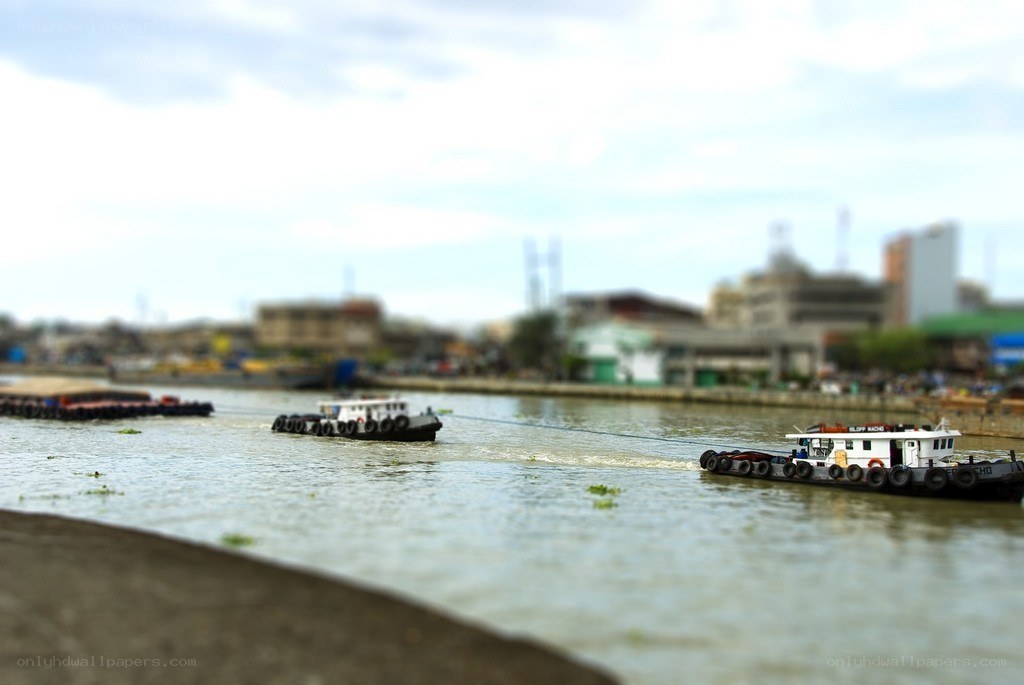 Tugboats on a river