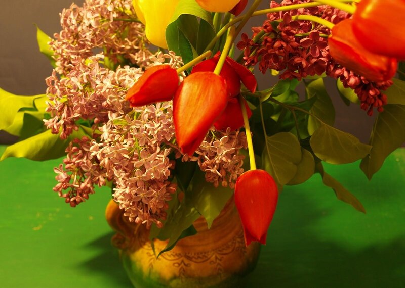 tulips and lilacs in a vase