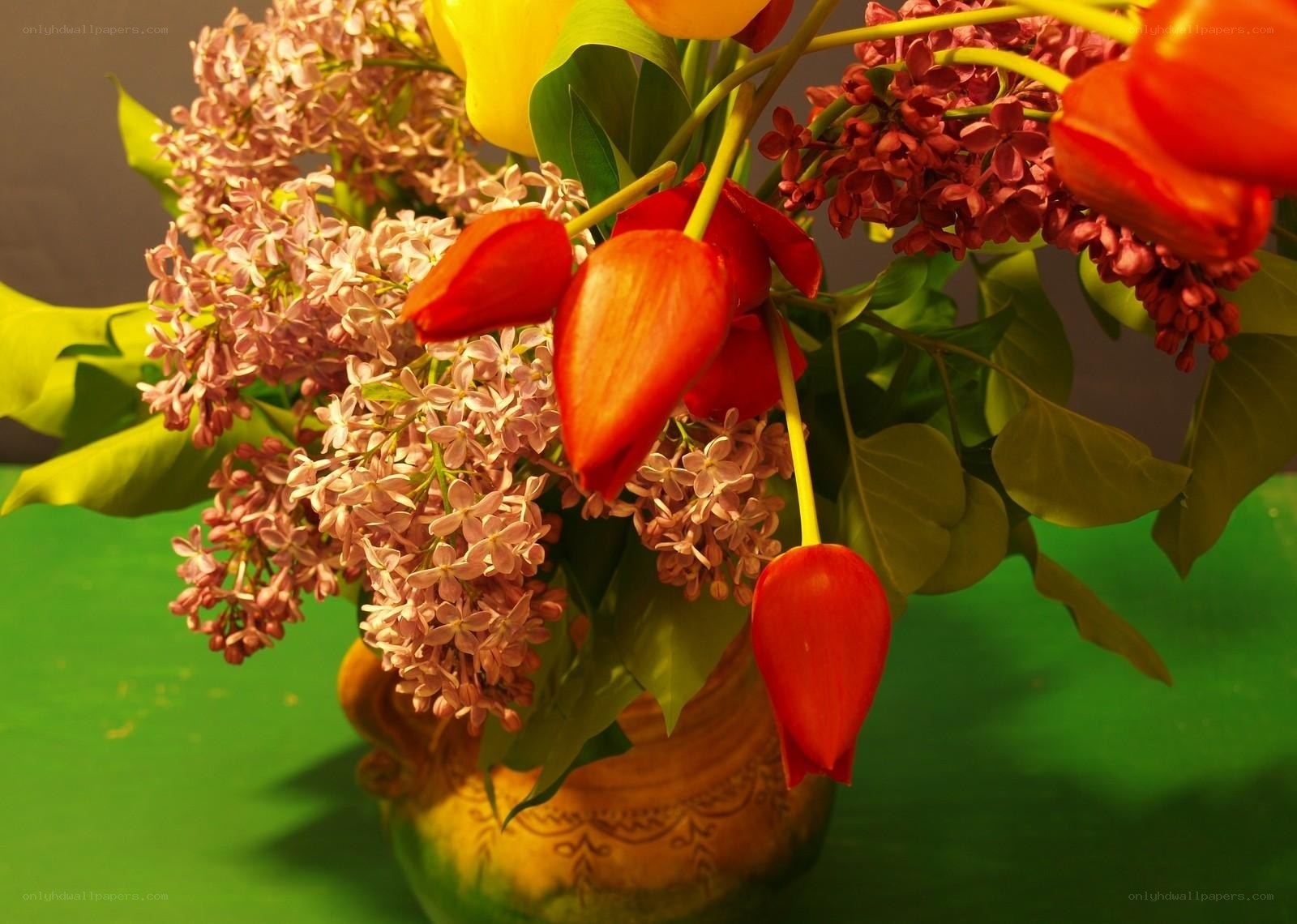 tulips and lilacs in a vase
