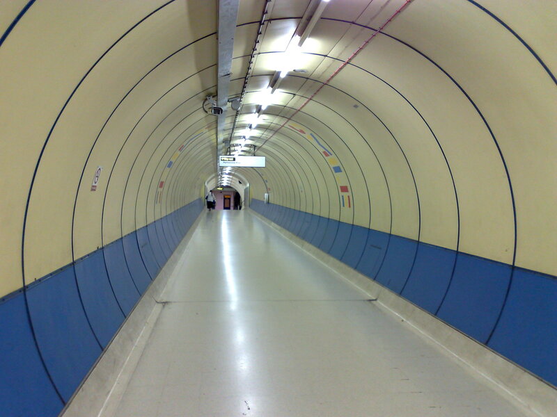 tunnel corridor with blue and cream walls
