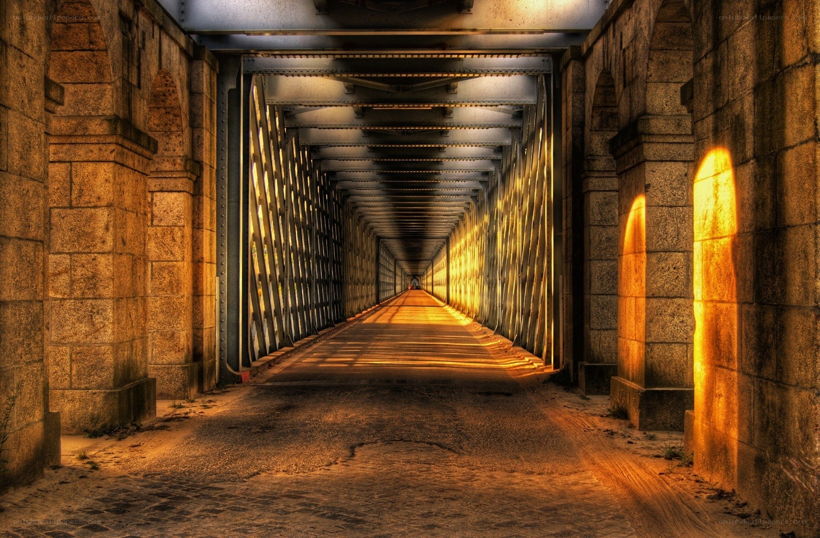 tunnel under a stone bridge