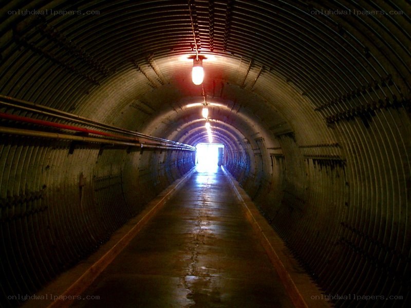 tunnel with corrugated metal walls