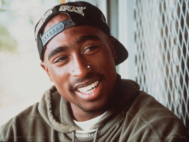 Tupac Shakur smiling