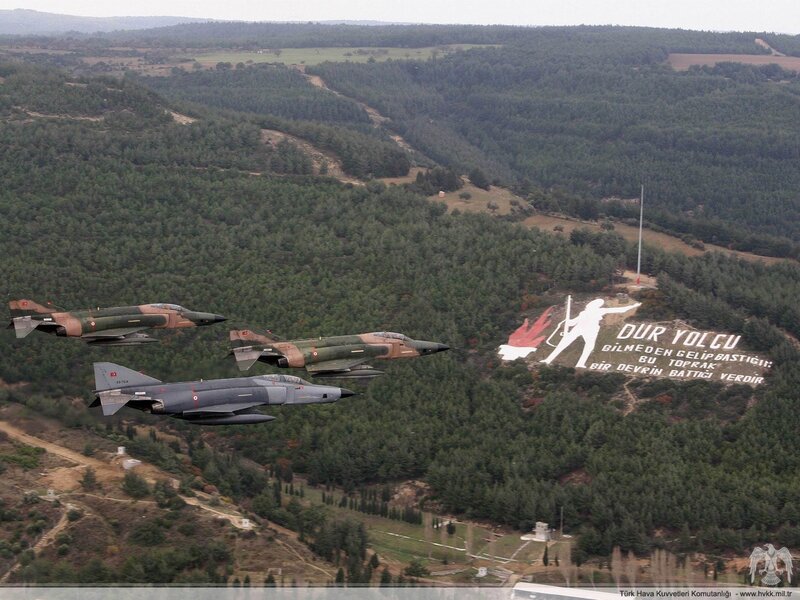 Turkish jets fly over forested hill