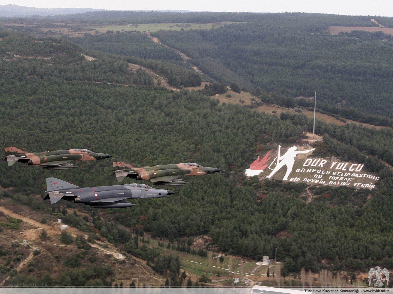 Turkish jets fly over forested hill