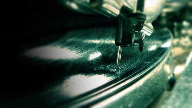 Turntable Needle on Vinyl — Black, Dark