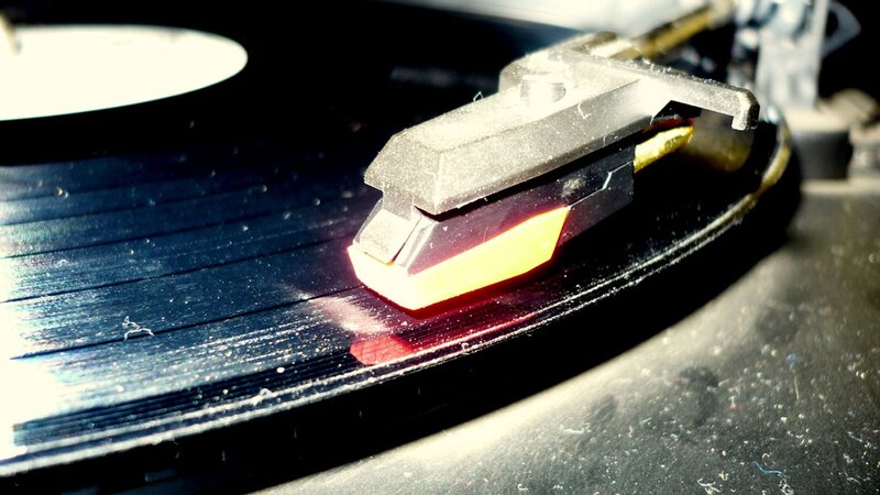 Turntable Needle on Vinyl — Black, Focused