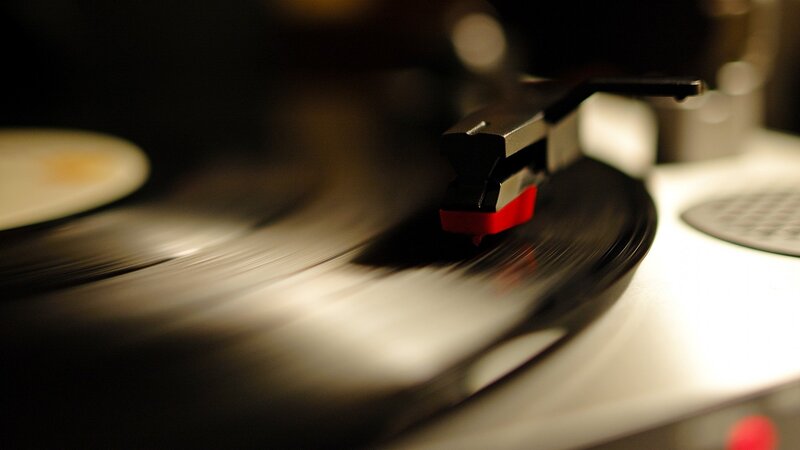 Turntable Playing Vinyl — Black, Focused, Photograph