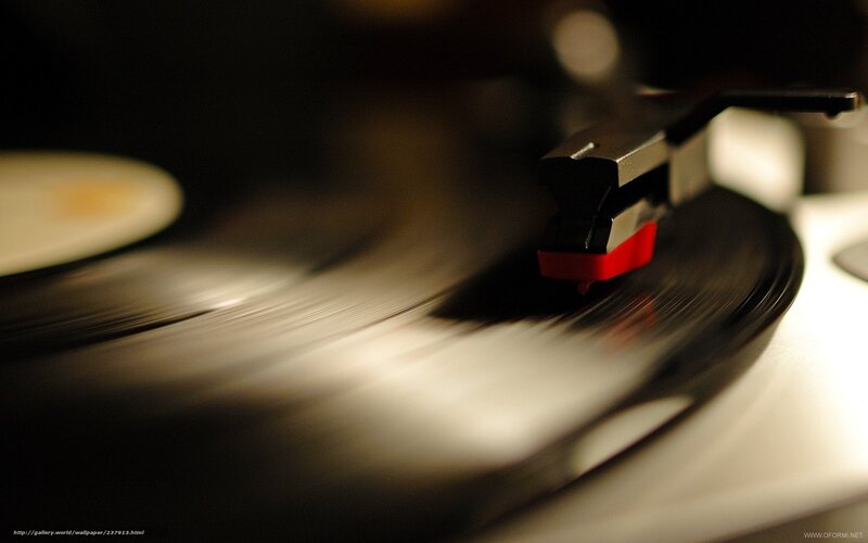 Turntable Playing Vinyl — Black, Focused