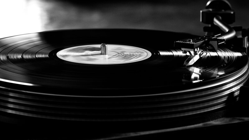 Turntable Playing Vinyl Record — Black, Dramatic