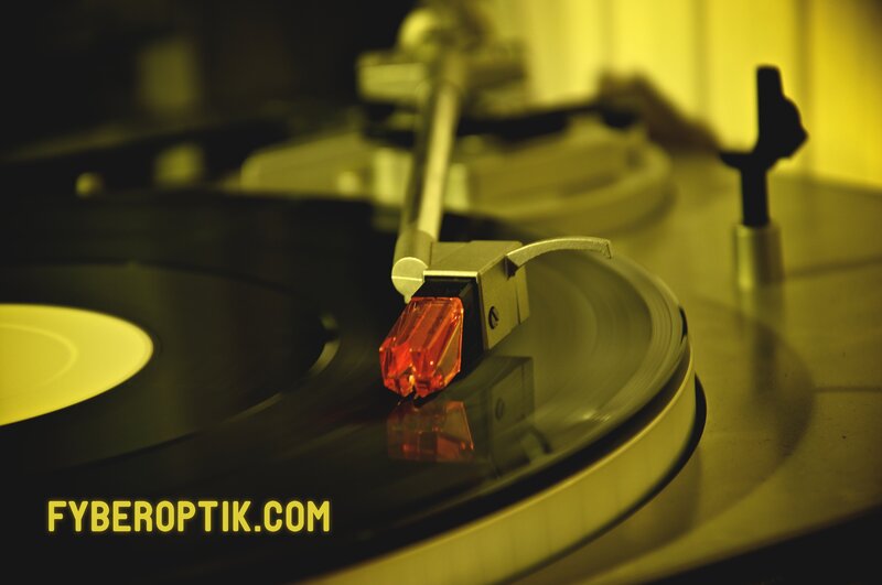 Turntable Playing Vinyl — Yellow