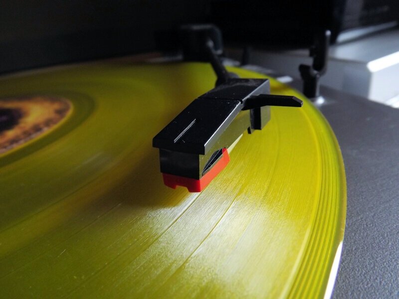 turntable playing yellow vinyl