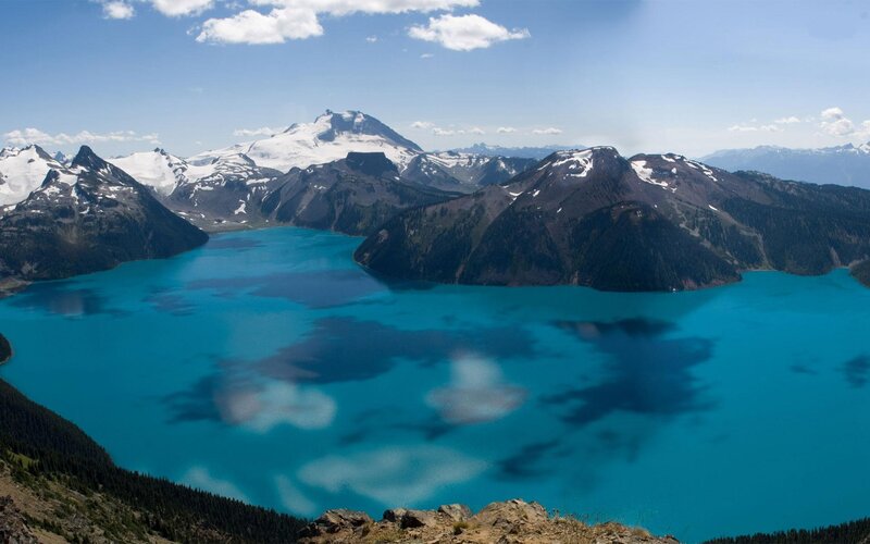 Turquoise Alpine Lake — Blue, Serene, Afternoon, Photograph, Mountains, Snow, Clouds