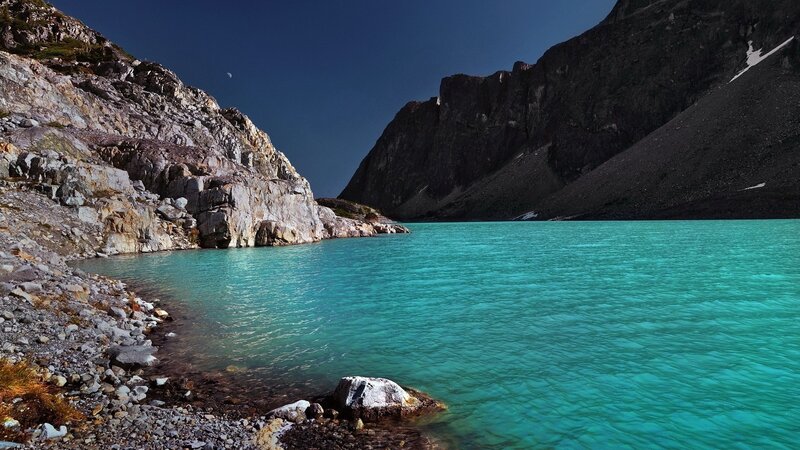 Turquoise Alpine Lake — Cyan, Serene, Night, Photograph, Mountains, Rocky Shore