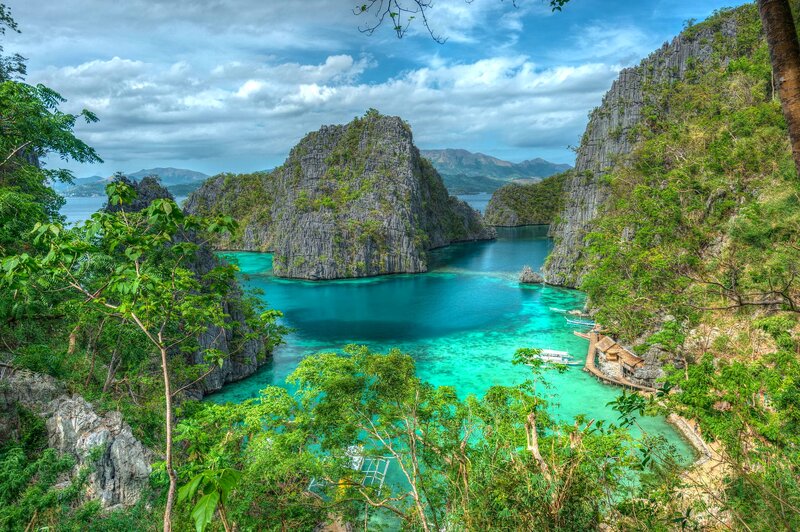 Turquoise Bay with Limestone Cliffs — Blue