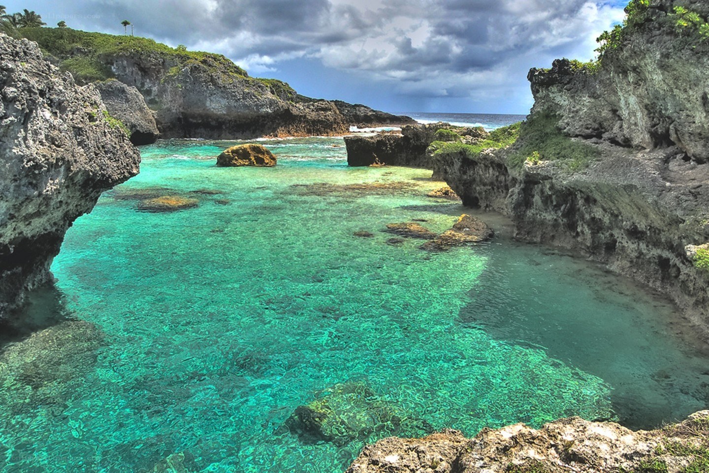 turquoise cove with rocky cliffs