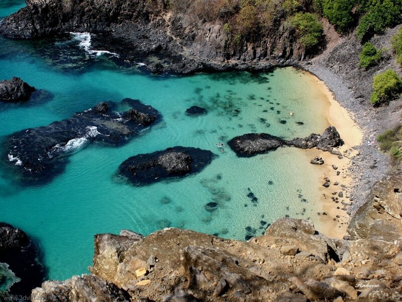 turquoise cove with rocky shore