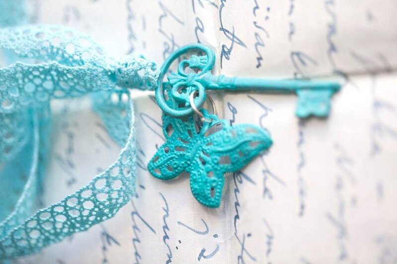 Turquoise Key with Butterfly