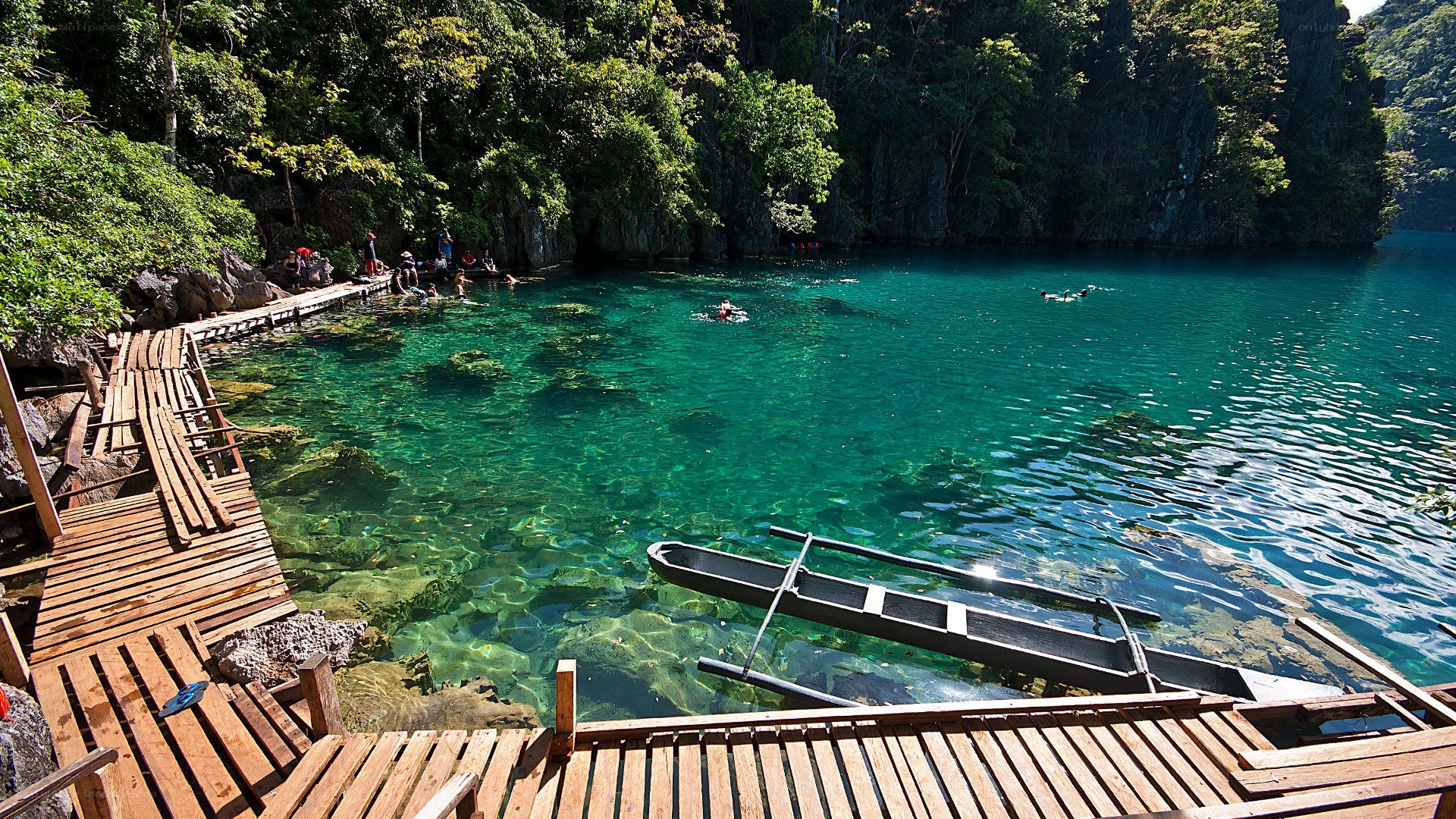 Turquoise lagoon with wooden docks
