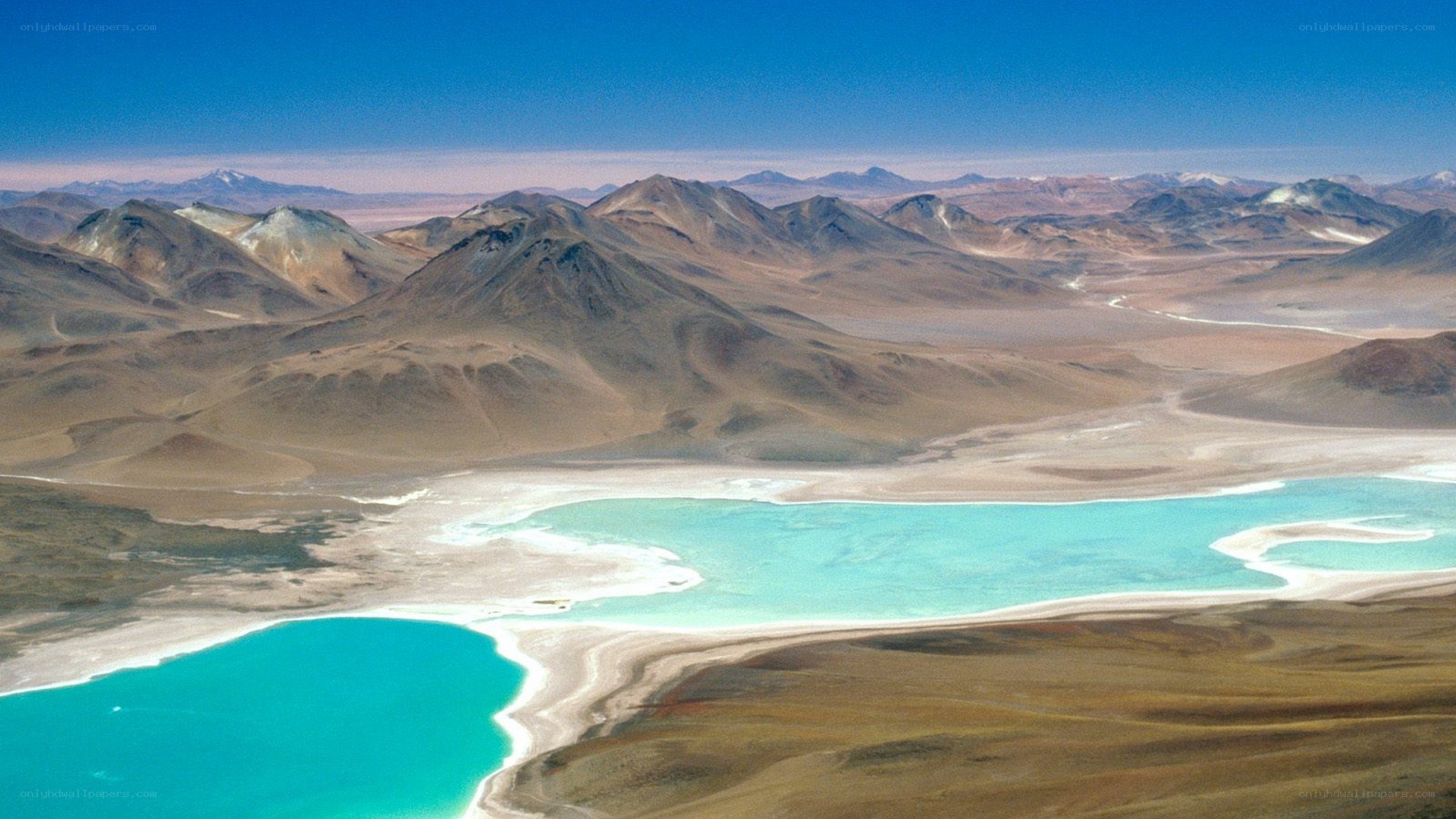 Turquoise lake in desert mountains