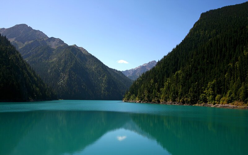 Turquoise lake in mountain valley