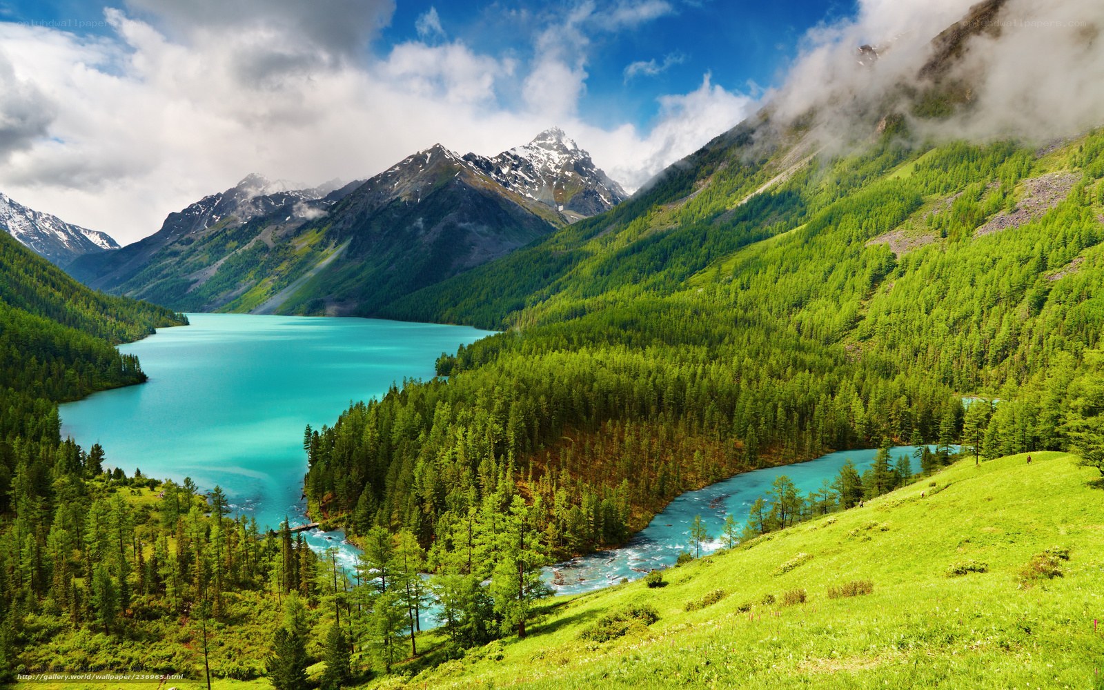 Turquoise lake in mountain valley