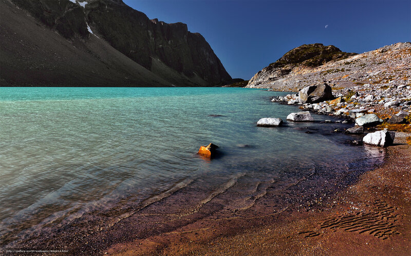 Turquoise lake in mountain valley