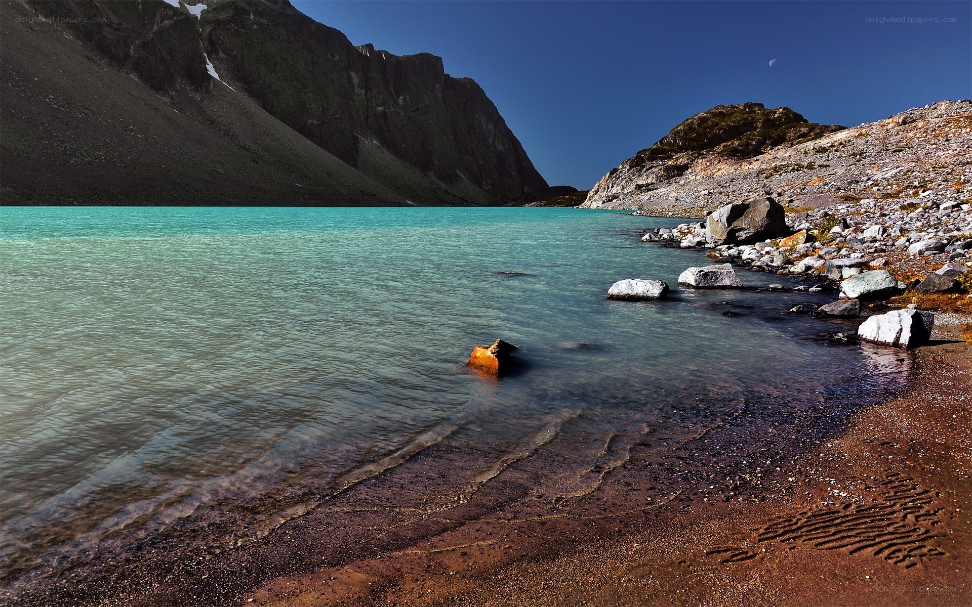 Turquoise lake in mountain valley