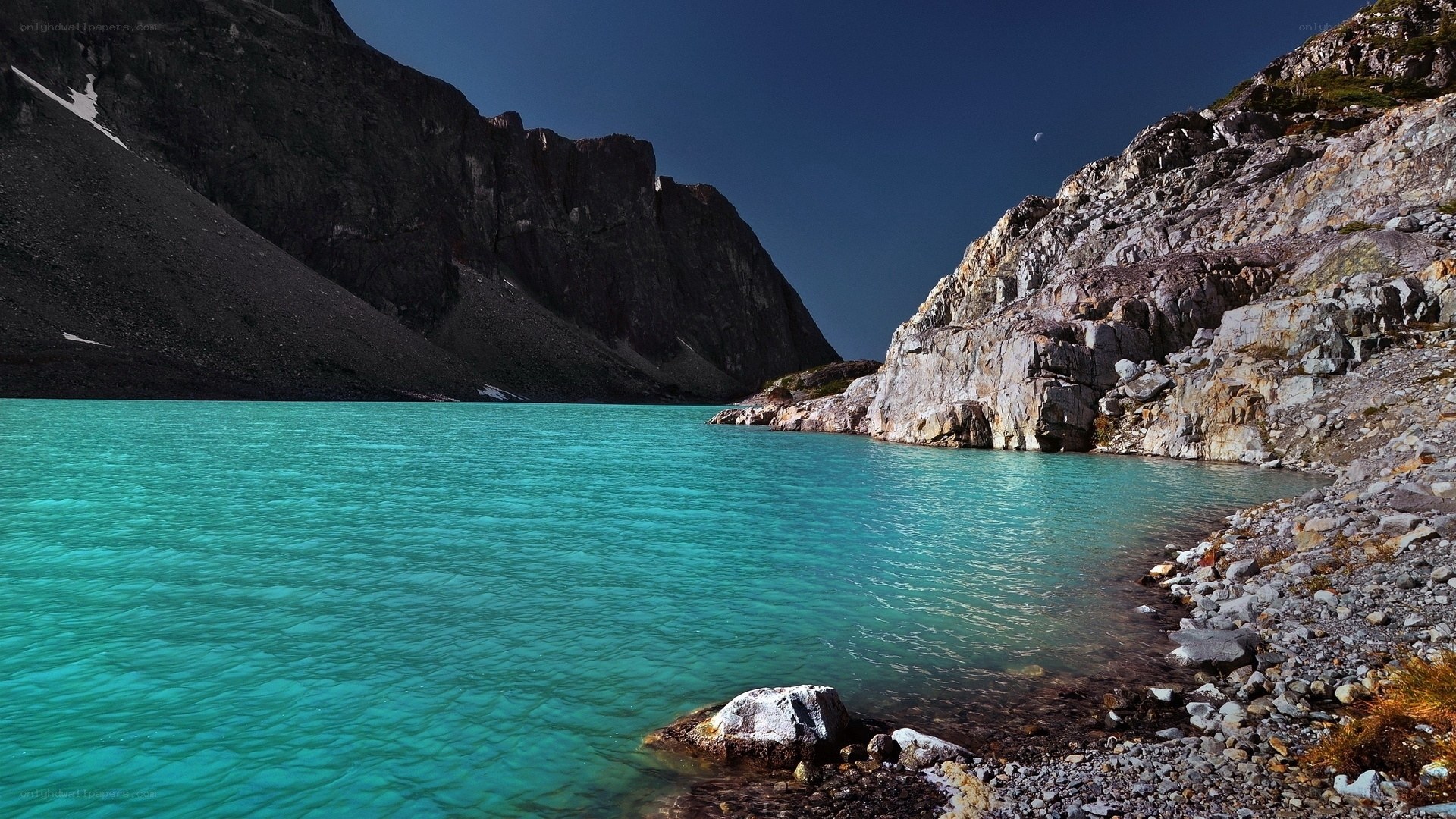 Turquoise lake in mountain valley