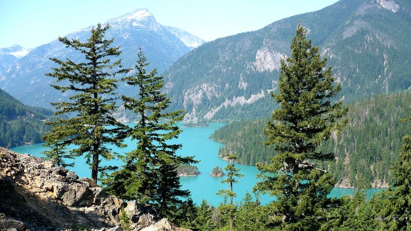 Turquoise Lake in Mountains — Blue, Serene, Afternoon, Photograph, Trees, Islands
