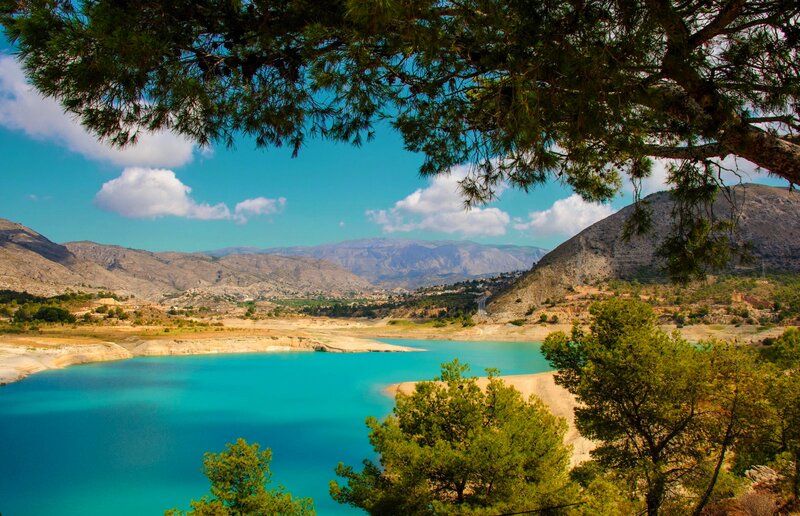 Turquoise Lake in Mountains — Blue, Serene, Afternoon, Photograph, Trees, Sky