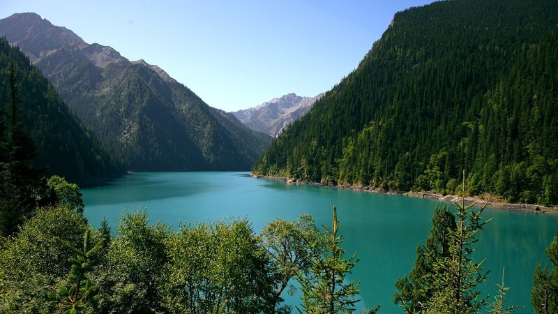 Turquoise Lake in Valley — Blue, Serene, Afternoon, Photograph, Mountains, Forest, Sky, Green, Brown