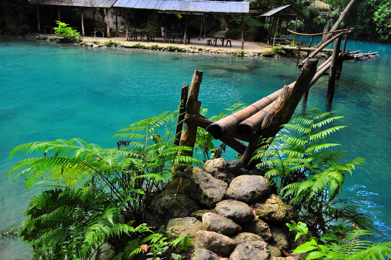 Turquoise Lake with Bamboo Bridge